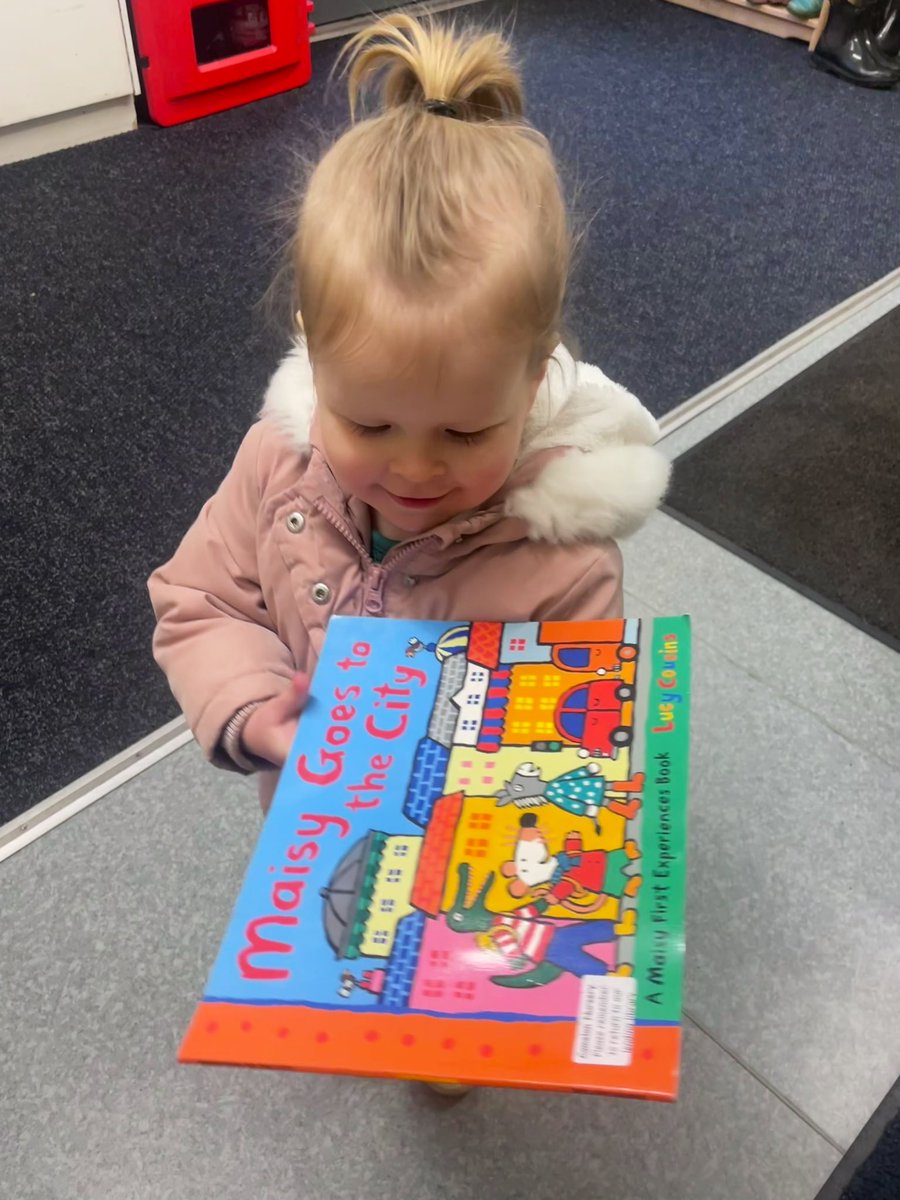 R is delighted with the book she has  chosen to borrow from @CamelonELCC to celebrate #WorldBookDay2023 📚❤️