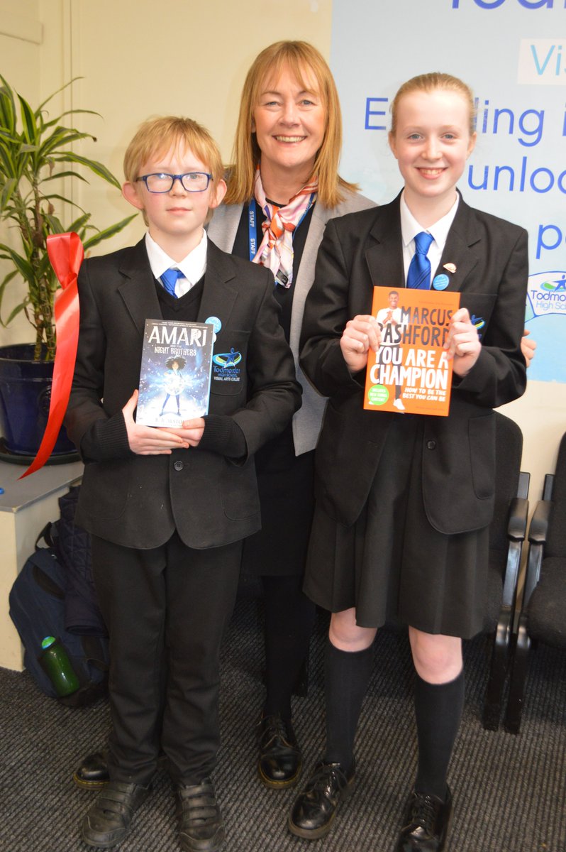 TodmordenHigh's tweet photo. For World Book Day we unveiled our new rewards book vending machine and two new students received books for being super stars. All students and staff in school read Lark by Anthony McGowan - a book in a day! #WorldBookDay https://t.co/59qrbr1r5g