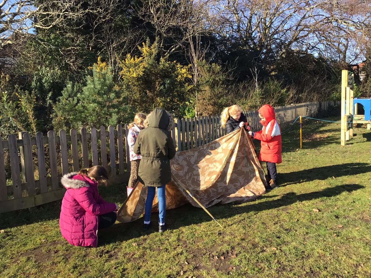Year 4 hard at work making shelters on this beautiful sunny day! ☀️