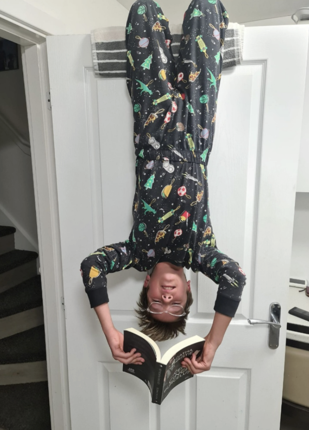 DSATStPeter's tweet photo. Enjoying stories at bedtime in our pyjamas, and extreme reading are the order of the day at St. Peter's. @dsat @DSATStPeter #WorldBookDay2023 https://t.co/Mjg39JpUFE