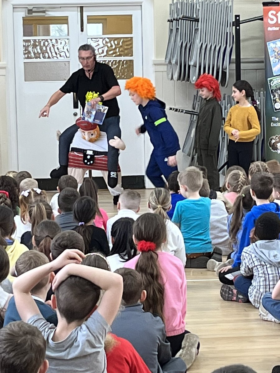 ParkPSClacks's tweet photo. What a fantastic audience for an amazing author @StuartReidBooks who visited us @ParkPSClacks today. 
Lots of laughs &amp; discussion around story writing &amp; things to consider when writing a book. Classes in P4-7 were gifted with a selection of Stuart’s books…and he’s coming back!!! https://t.co/jxzk5o51OA