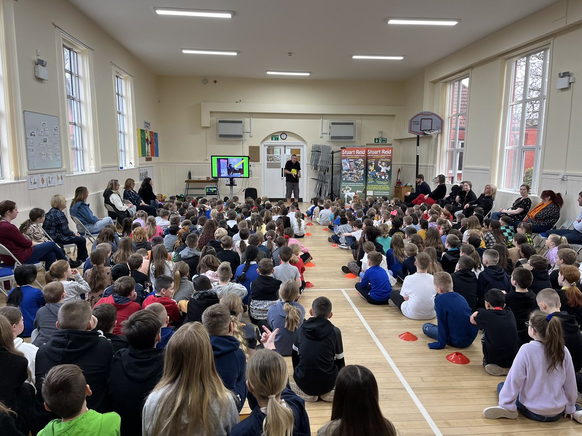 ParkPSClacks's tweet photo. What a fantastic audience for an amazing author @StuartReidBooks who visited us @ParkPSClacks today. 
Lots of laughs &amp; discussion around story writing &amp; things to consider when writing a book. Classes in P4-7 were gifted with a selection of Stuart’s books…and he’s coming back!!! https://t.co/jxzk5o51OA