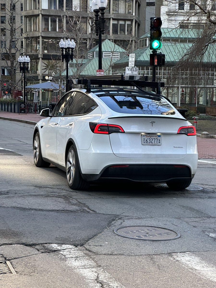 Nothing unusual about a Tesla with a ladder-type camera setup running around the same corner five times.