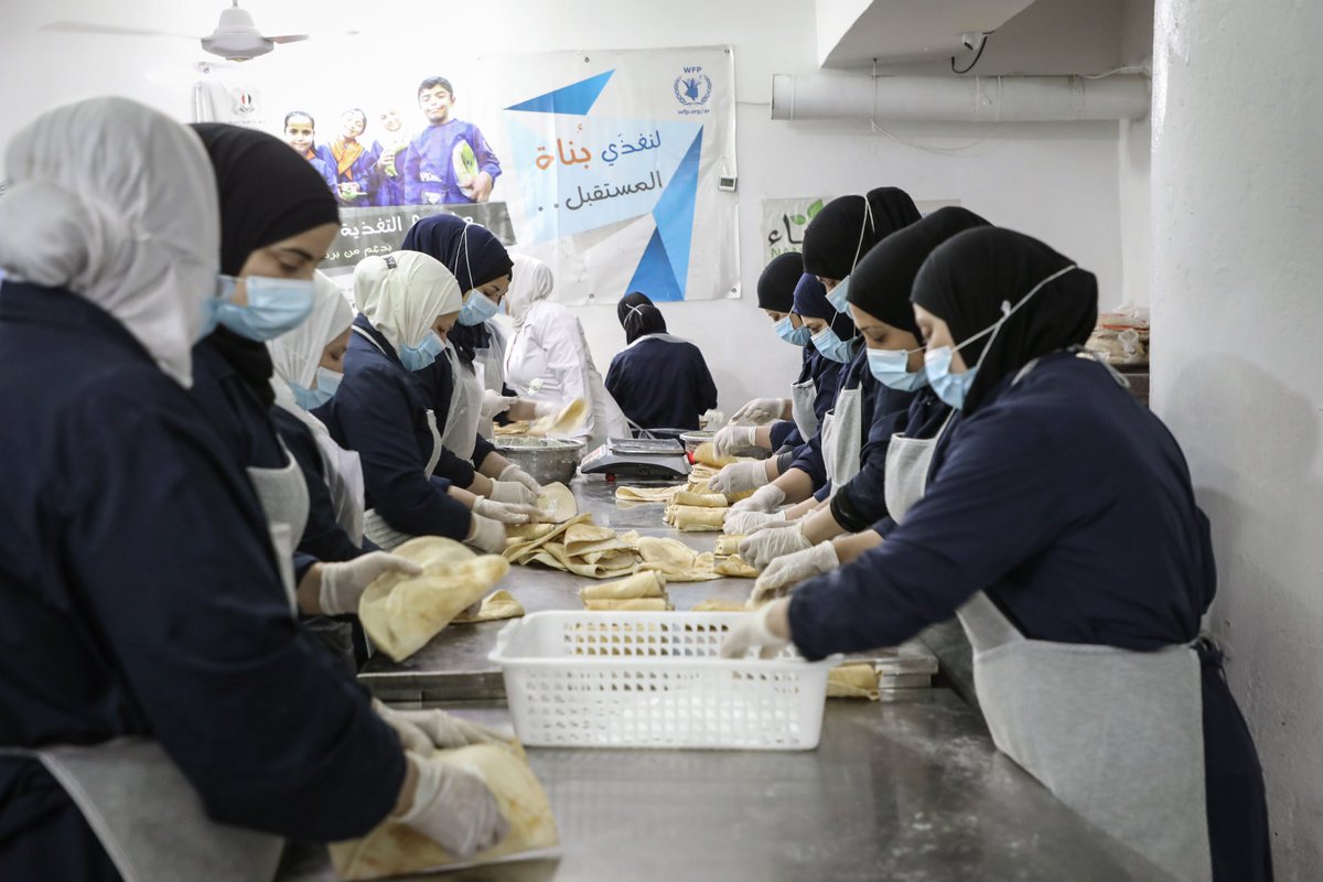 OCHA_Syria's tweet photo. Mariam is one of about 50 women in this #Namaa kitchen in #Aleppo who prepare fresh sandwiches for people in shelters. Thanks to her and other single mothers who are breadwinners, nearly 30,000 #earthquake-affected people are able to start their day with a healthy breakfast. https://t.co/lKKRwRfMYH