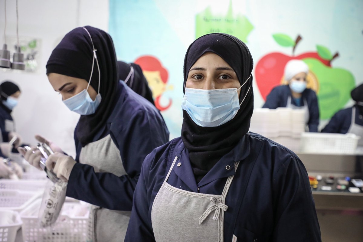 OCHA_Syria's tweet photo. Mariam is one of about 50 women in this #Namaa kitchen in #Aleppo who prepare fresh sandwiches for people in shelters. Thanks to her and other single mothers who are breadwinners, nearly 30,000 #earthquake-affected people are able to start their day with a healthy breakfast. https://t.co/lKKRwRfMYH