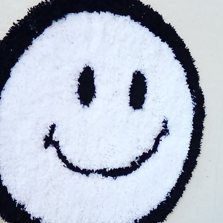 PatrickMwenitet's tweet photo. So.. i have officially learnt my first 2023 skill,rug making,and this was my first order,customized a smiley face i'm proud of...could make anything you want!🙂 https://t.co/rPCJfd9u2v