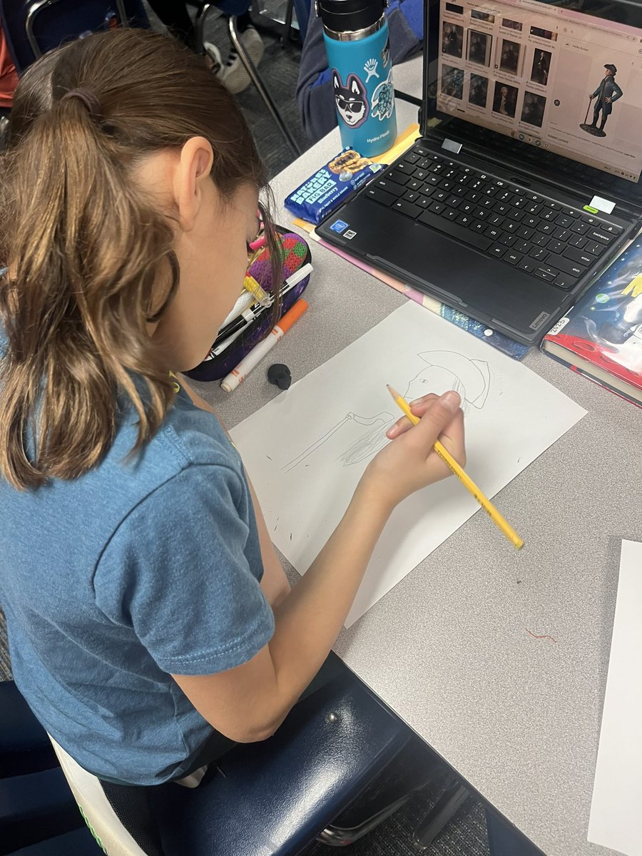 Our 5th grade students are analyzing the relationship among characters by creating character trading cards.