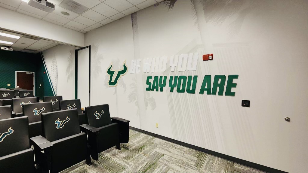 OAICorp's tweet photo. The football team can now have meetings, discuss and make decisions in style in their newly elevated meeting room. Rainier + OAI produced and installed the wallpaper and plexiglass letters.
.
.
.
#visualbranding #branding #meidaroom #usf #football #collegefootball https://t.co/UGkoTRsXxJ
