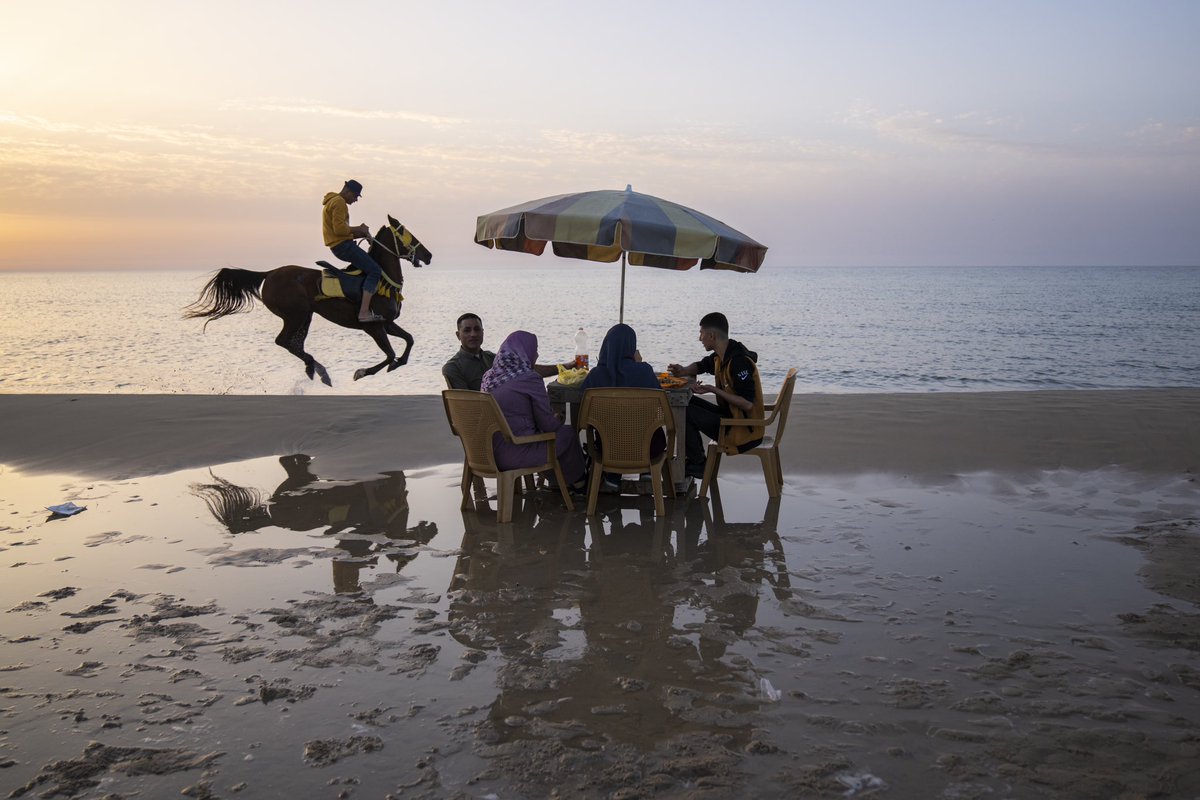 Palestinians enjoy their day on the beach in Gaza City. (AP Photo/Fatima Shbair)