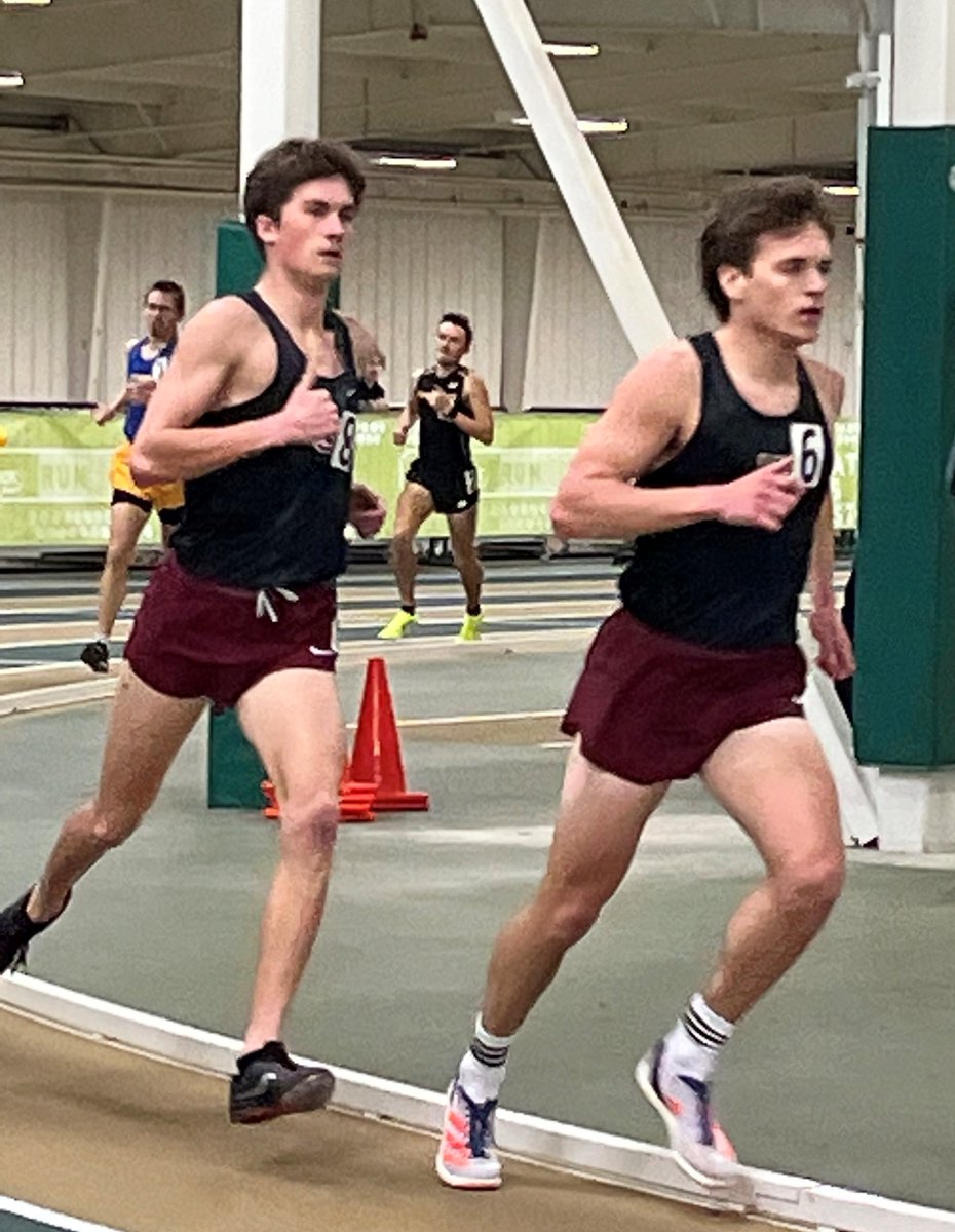 Junior Carter Burcham and Freshman Winston Ransone on pace in the mile at the JDL Fast Track.