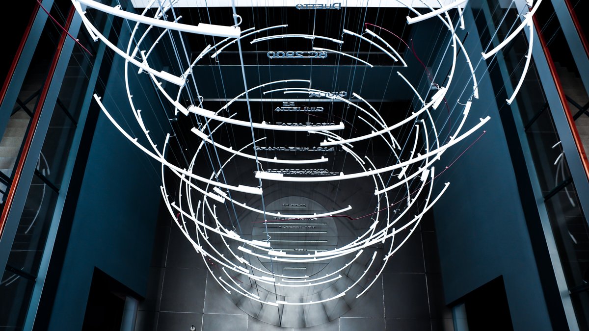 iGuzzini's tweet photo. A transparent cylinder crosses all the floors of the @AlfaRomeoMuseo in Arese in an explosion of lights and suggestions: it is the Alfa Romeo DNA, our special product, developed in collaboration with the FCA Style Centre.
#iGuzzini #MuseoCity #AlfaRomeo https://t.co/M67ISwDRmr