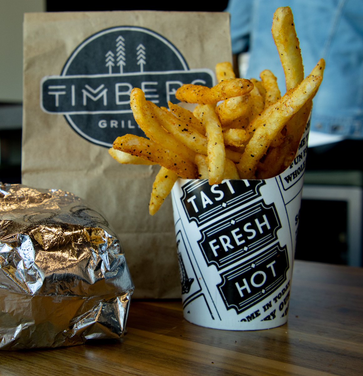 Receive a free fry or Timber Tots with a sandwich or chicken tenders purchase when you wear your #FearTheBird Shirt today at Timbers Grille.