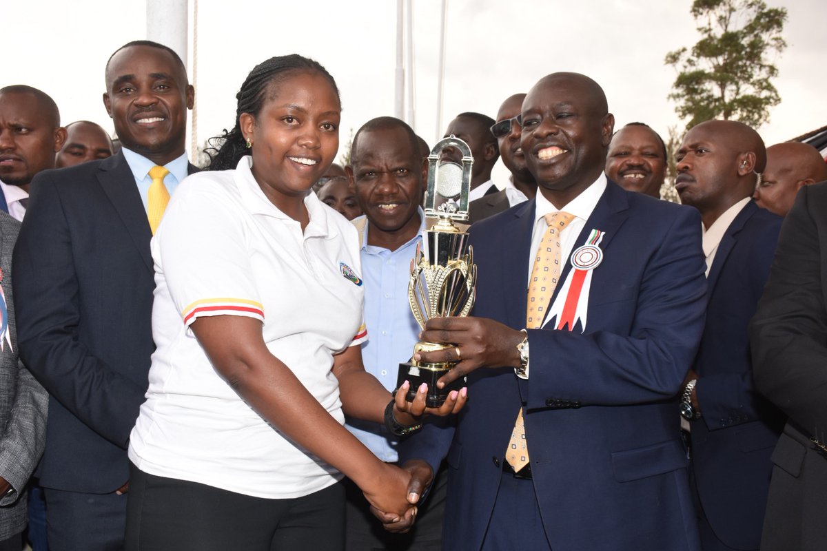 Deputy President of the Republic of Kenya, <a href="/rigathi/">Rigathi Gachagua</a> presents a trophy for the "The Best Display and Services in the Health Sector and Pharmaceutical Stand" category won by <a href="/NCKenya/">Nursing Council of Kenya</a> to <a href="/june_chumba/">Doreen June Chumba</a> during the the Official Opening Ceremony of the 2023 Eldoret ASK Show.