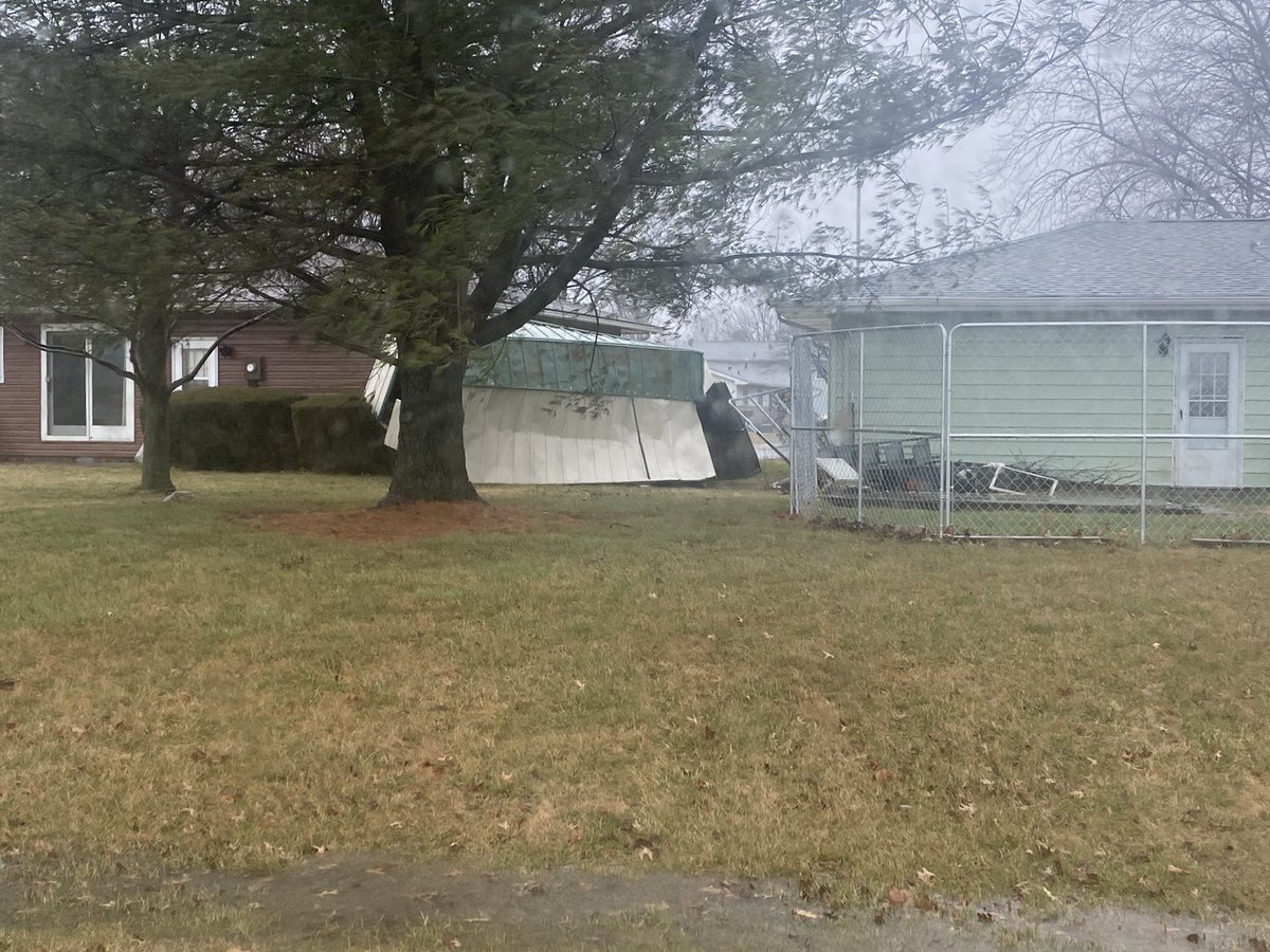 jcfultz's tweet image. The strong winds have caused some damage across the area today. The tree and shed photo are in Bethany and the power pole is at the corner of IL-105 and Esther road just east of Decatur. Snow/sleet causing slushy roads. @NWSLincolnIL