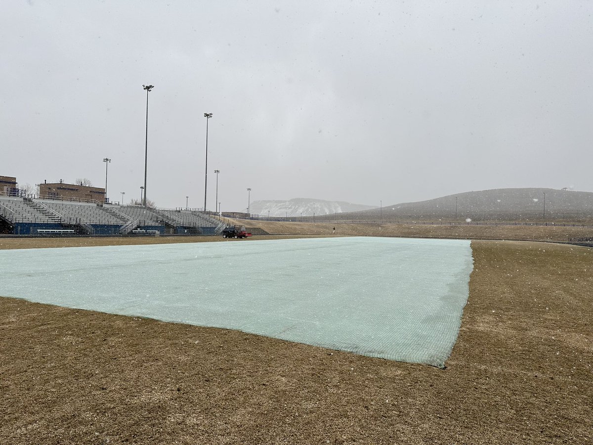SportsTurfSun's tweet photo. Our #Crewof2 put out a couple grow covers today, after we got them defrosted! They were frozen in place where we store them, so we had to get creative. 🤷♀️ Pinned the final edge just as the snow ❄️ started too! #BestOffice @ChristiClay23 @CSTMA_TURF https://t.co/X2IoQE1Lkz