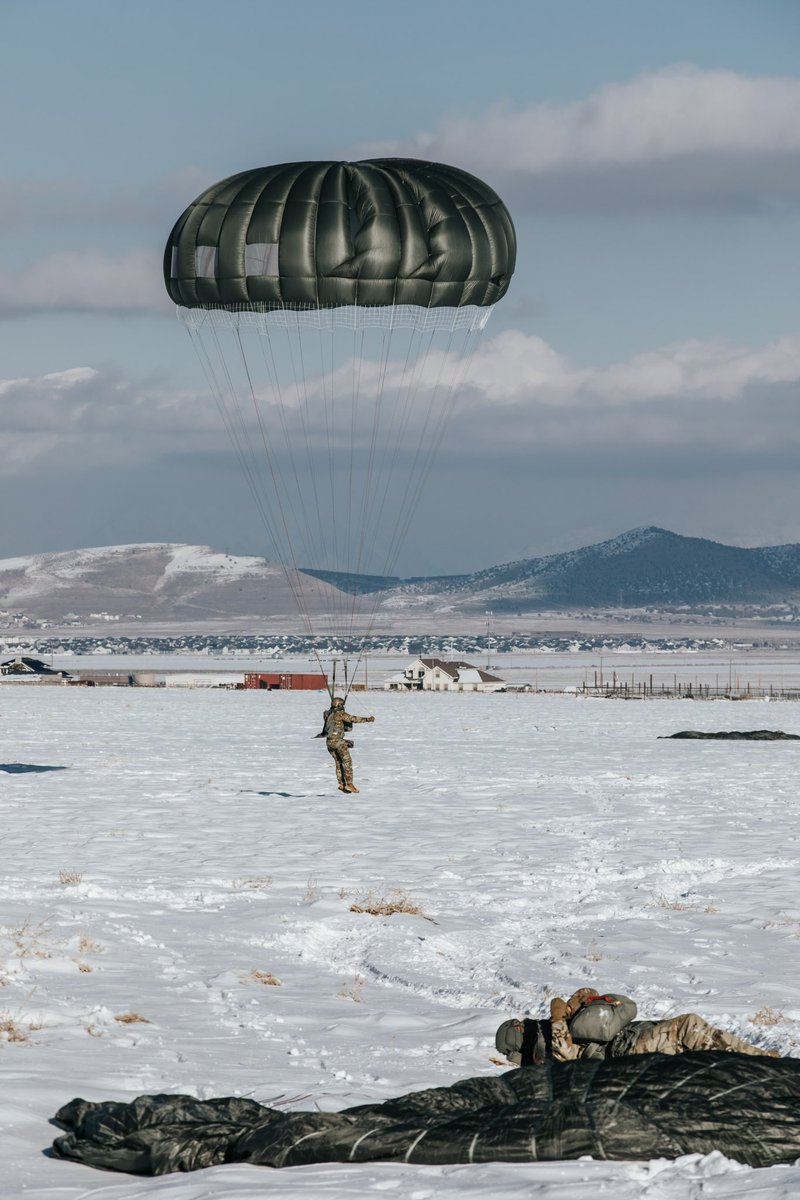 The red tape on the Soldier's helmet signifies it is his first jump with his unit since completing airborne school ensuring more experienced jumpers can mentor these new members of the community. photo by Spc. Mackenzie Willden)
*full caption our Instagram