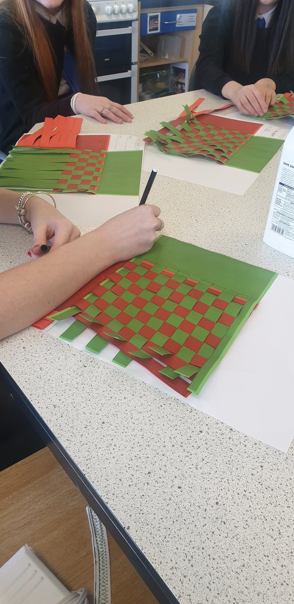 IRA_HomeEc's tweet photo. S1s having fun learning about weaving for our textiles unit. Started with paper weaving 🧵👕⭐👏 @IrvineRoyalAcad https://t.co/3E3q6XjWjH