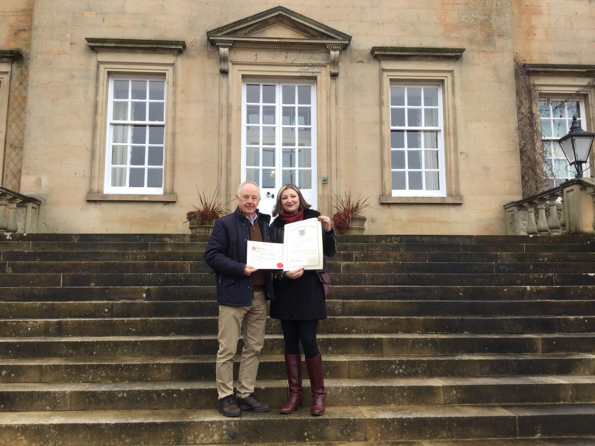 New member of the Incorporation is Kelly Espindola  a young Scottish fashion designer specialising in handcrafted leather accessories. Based at Dumfries House, she is a future textile tutor with the Prince's Foundation. Pictured here with Late Deacon Brian McAlinden CBE.