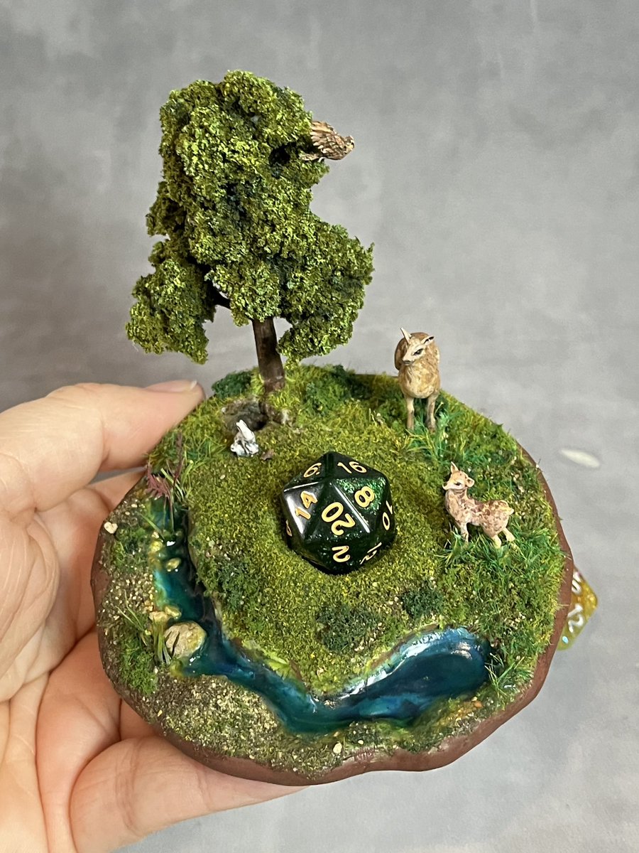 Nerfblat's tweet photo. @AllTheWitches_ #selfpromosaturday is starting off with a bang. Overnight I sold the small waterfall island I just finished, but โThe Gladeโ deluxe large island (and others) are available on our website or Etsy. #dicegoblin #diceisland #dicedisplay #ttrpgcommunity
https://t.co/U1kCig9NEK https://t.co/o62aWpGpmc