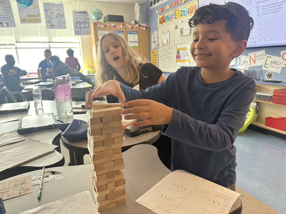 RangeElementary's tweet image. Ms. Riddle’s class reviewing for their reading checkpoint with a little Jenga fun! 🥳😄