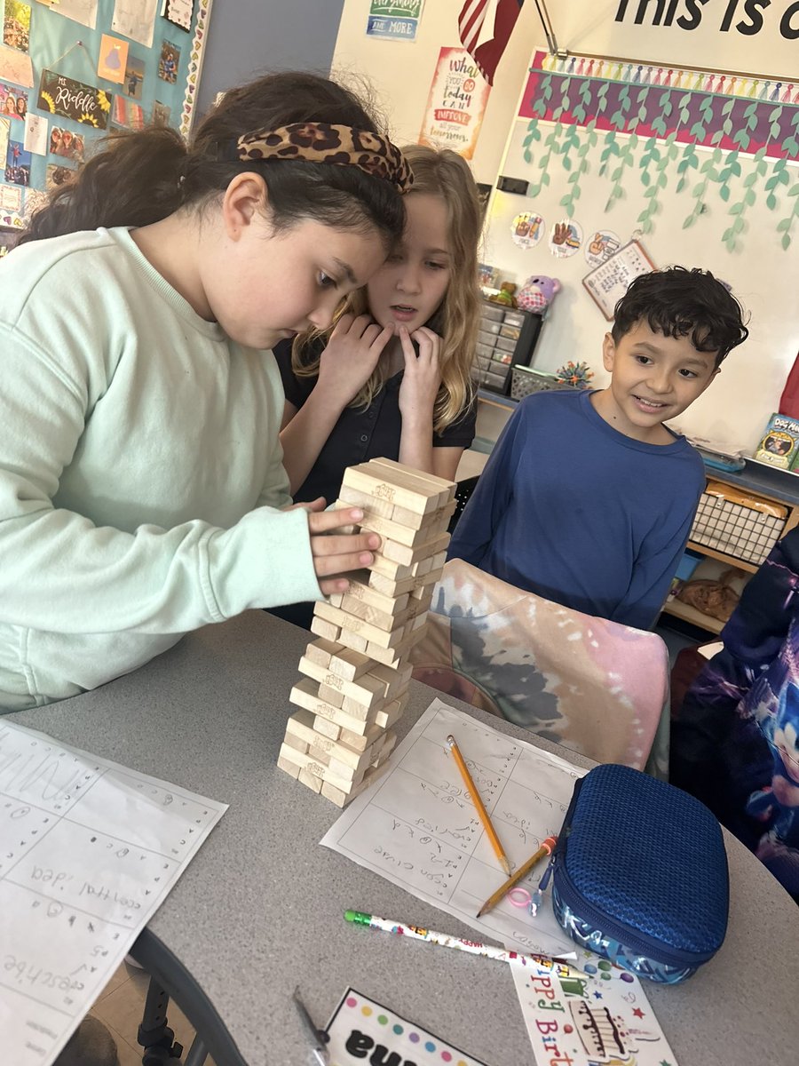 RangeElementary's tweet image. Ms. Riddle’s class reviewing for their reading checkpoint with a little Jenga fun! 🥳😄
