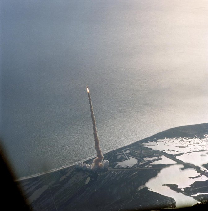 An aerial view of early stages of the sixteenth launch of Space Shuttle Columbia was provided by a 70mm camera aboard the Shuttle Training Aircraft (STA). Launch occurred at 8:53 a.m. (EST), March 4, 1994. 
