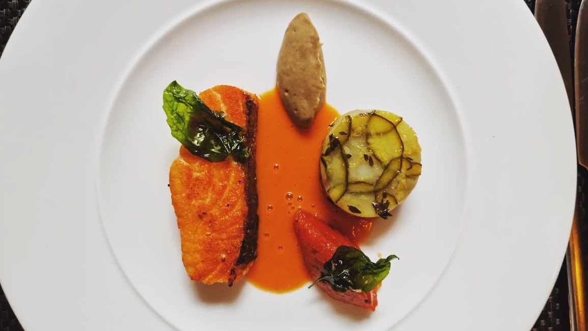 Pave of Scottish salmon cooked a la Plancha with Mediterranean vegetable tian, aubergine purée, tomato fondu and a tomato and basil sauce #purslanerestaurant #edinburgh #salmon #tomato