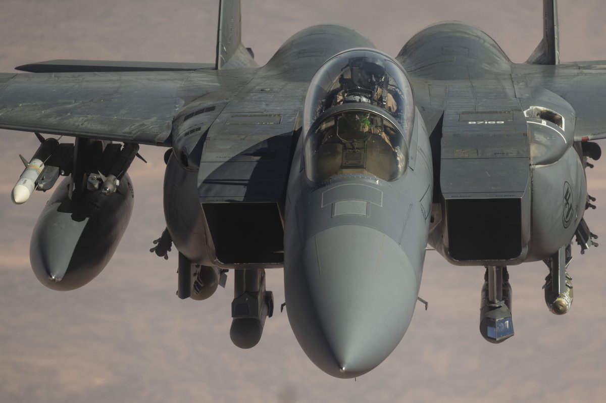 Objects in mirror may be closer than they appear.

An F-15E from the 389th Expeditionary Fighter Squadron approaches a KC-10 for refueling over the CENTCOM region.