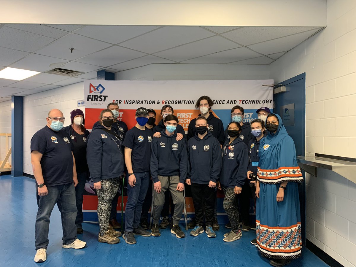 SRL_6514's tweet photo. The Robo-Sabres! We paused while refueling the humans to snap a team photo - waiting (im)patiently for lunch to end so we can play our next qualification round! 🤓❤️🤖 @SuttonDHS @CANFIRST #ChargedUp #SabresHavingFun https://t.co/FCYb81lNs9