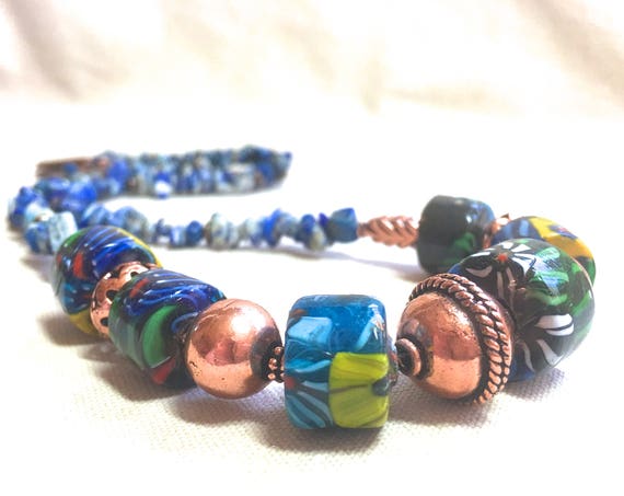 ZenCatPottery's tweet photo. Blue African Trade Bead https://t.co/t56DzqaXiq via @EtsySocial #zencatpottery #etsysocial #BlueAfricanTrade #TradeBeadNecklace https://t.co/LAJeWoNZnq