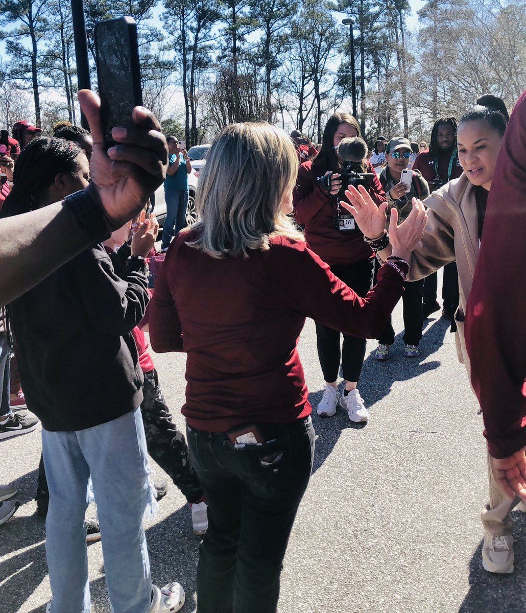 hajones33's tweet photo. Got to high-five @dawnstaley before the @GamecockWBB win and got a picture with the #bushbeans dog! It’s been a great day! ❤️ https://t.co/ZHkQwXxKq9
