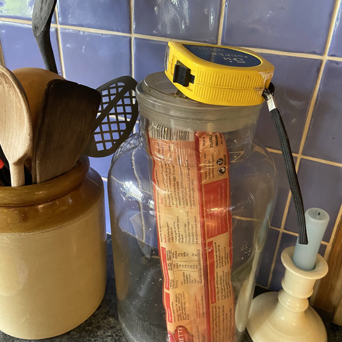 Some things make no sense and perfect sense. All in one. For the past 15 years or more this is where my parents keep their measuring tape,in their perfectly tidy house. It’s just where it lives. And the 5 times a year they need it, it’s ready to go by the pasta and wooden spoon.