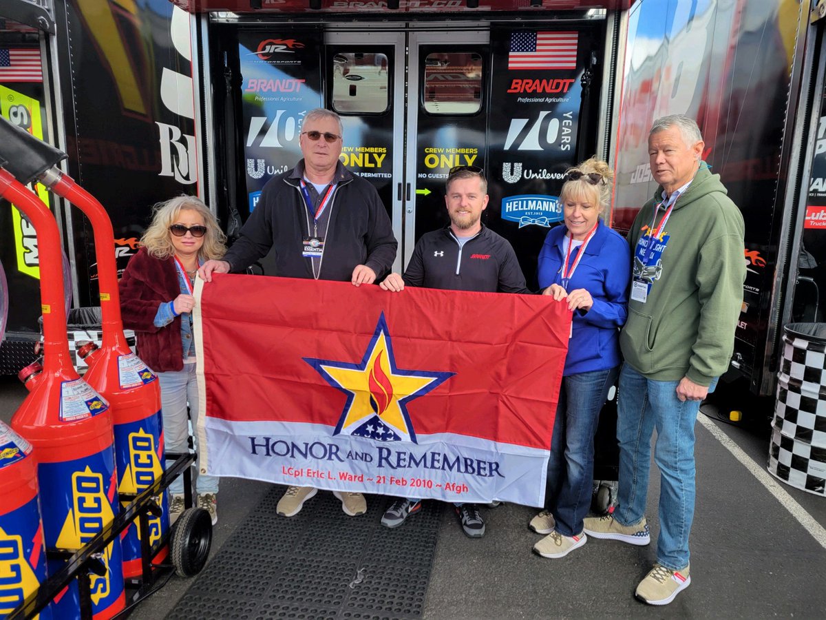HonorRemember's tweet photo. The family of Lance Cpl. Eric Levi Ward with Infinity driver @j_allgaier and the Good Year Racing Team at today’s NASCAR Xfinity Alsco Uniforms 300 race. Thank you, @NASCAR. Together We Remember Them All! #NascarSalutes #XfinityRacing #FoxSports #GoodYearRacing #FallenWarrior https://t.co/FPNXXnonV8