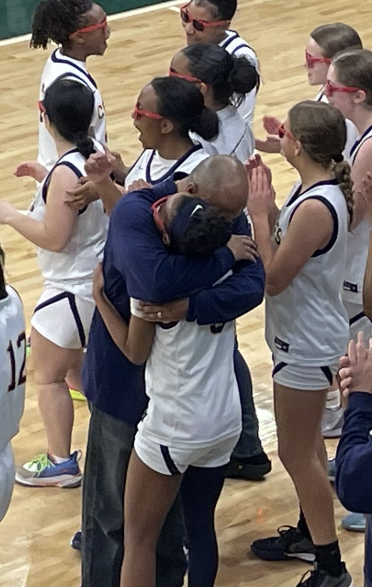 Sharing a moment with my daughter, after winning the state championship. So proud of her and her teammates!