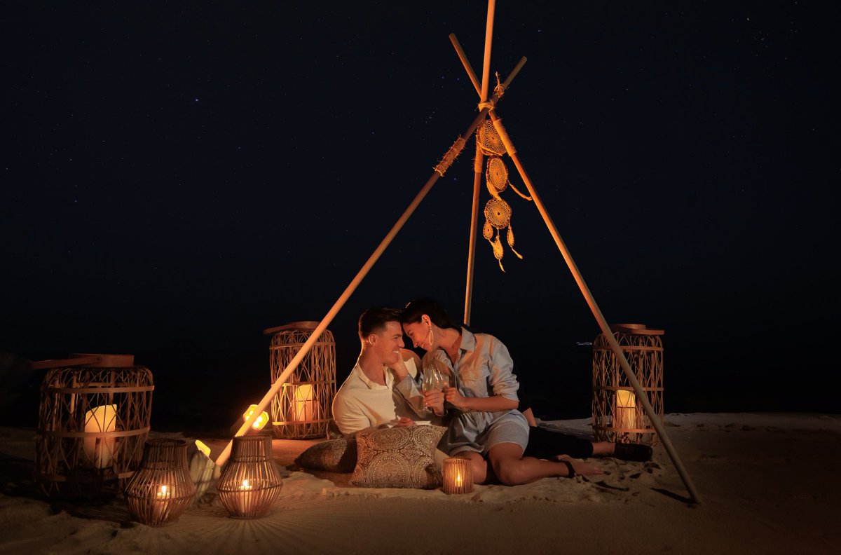 Find the perfect couples getaway at Grand Velas Los Cabos! A honeymoon journey with romance under the stars at a fantastic dinner on the beach. Save this for your bucket list and book your dream vacation with us! #GrandVelasCabo