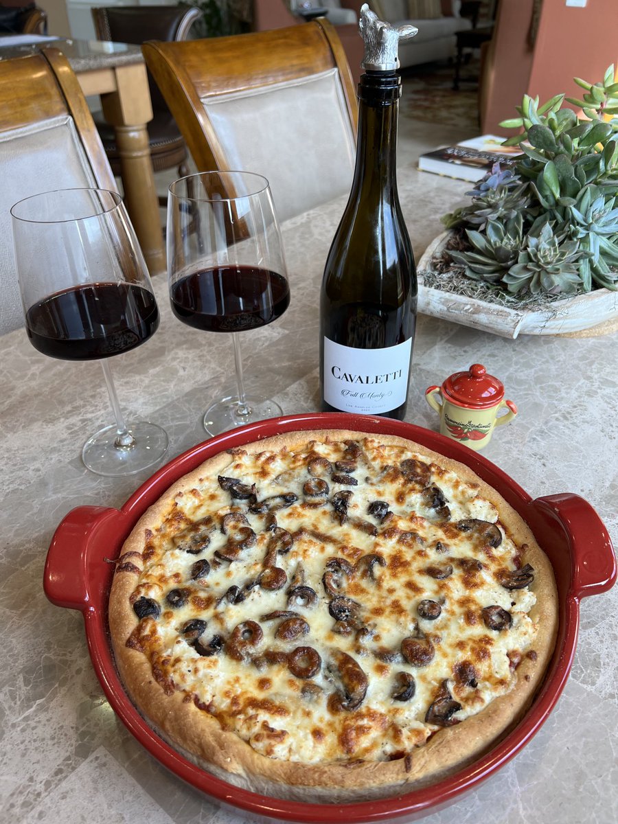 DavidP805's tweet image. Some home-made deep dish pizza and a Cavaletti red wine. Time to eat!