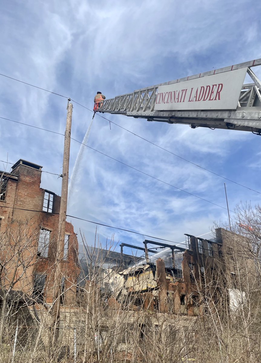 CincyFireEMS's tweet photo. It’s been a very long day for our firefighters but the fire on Arlington St is under control. We will have crews on scene all night as we extinguish the fire and raze the building. Expect to see smoke from this area. https://t.co/SViLg09z3l