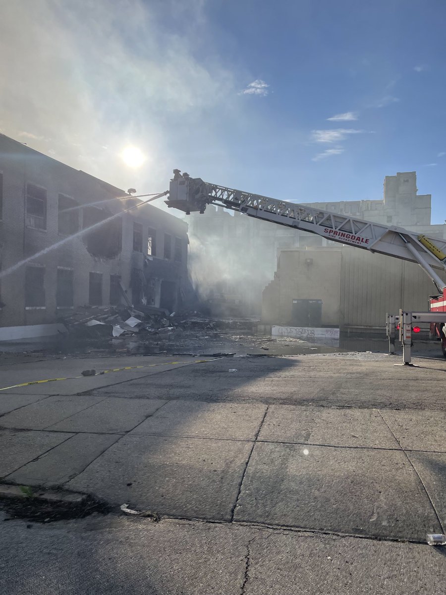 CincyFireEMS's tweet photo. It’s been a very long day for our firefighters but the fire on Arlington St is under control. We will have crews on scene all night as we extinguish the fire and raze the building. Expect to see smoke from this area. https://t.co/SViLg09z3l