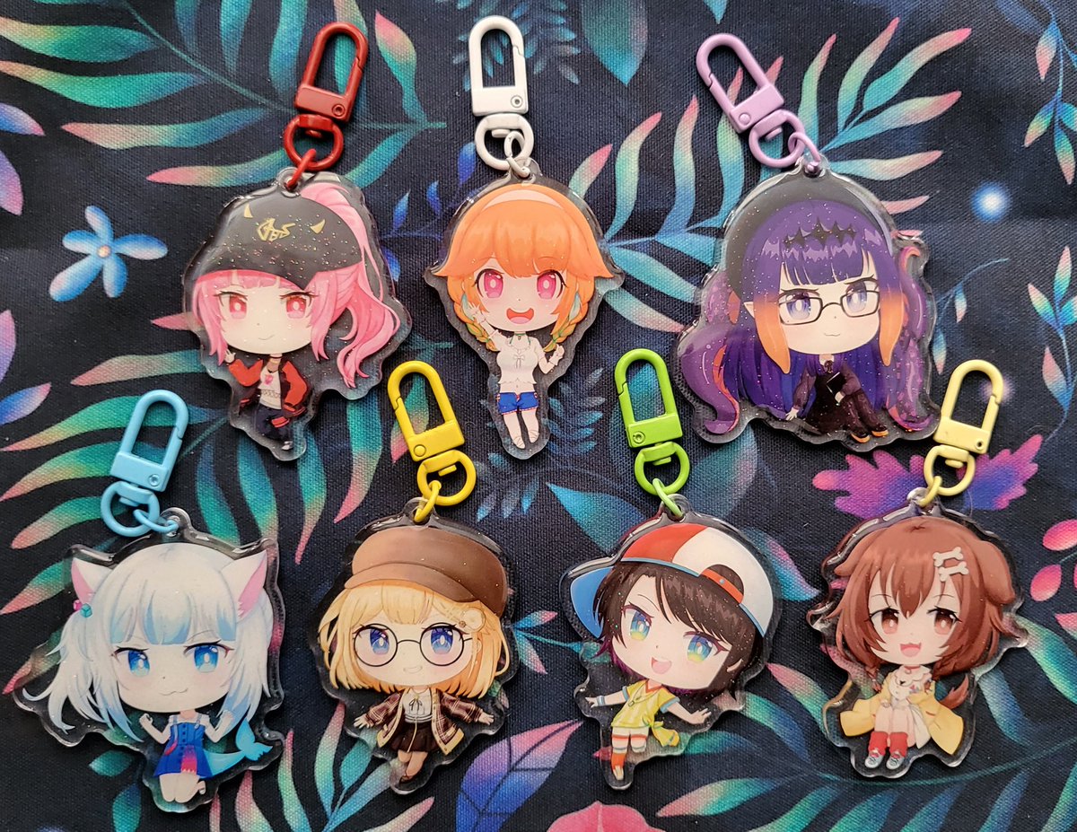 pandamisul's tweet photo. [RTs 💜] My Hololive charms and stickers are now listed in my sh0p! 
Charms are 2.5" epoxy glitter acrylic with different expressions on each side!
Stickers are 3" glossy vinyl.
Sh0p link is below ⤵️:
#hololive #HololiveEN https://t.co/hmZzwLP294