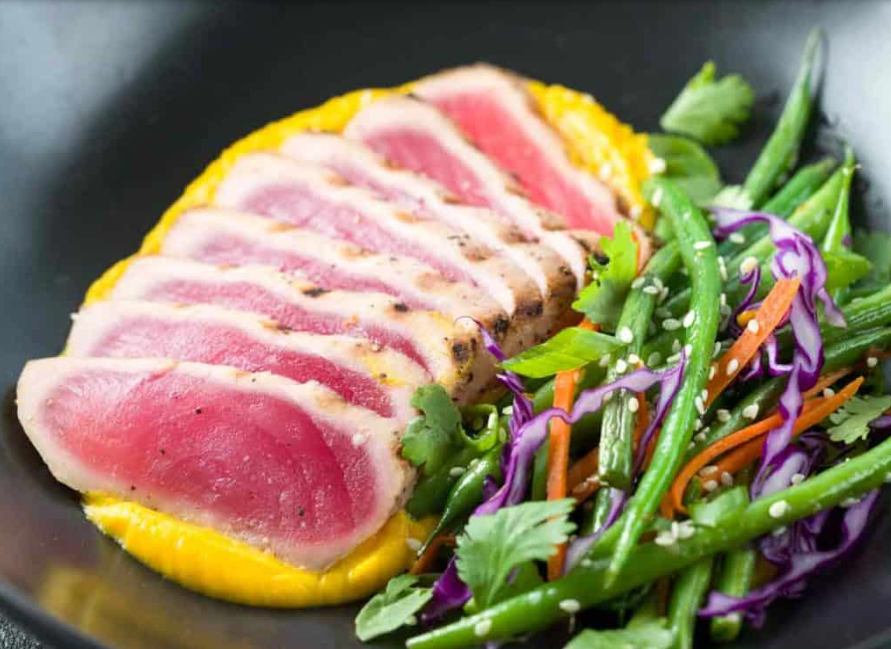 StateofSlim's tweet photo. Seared Ahi Tuna with Crispy Sesame Green Beans is a gourmet recipe made right at home! Serve with a delicious carrot, cauliflower, and ginger vegetable puree and crispy pan-sauteed sesame green beans for a quick and healthy meal. Recipe on Facebook. #HealthyEating https://t.co/Di9mECFNKH
