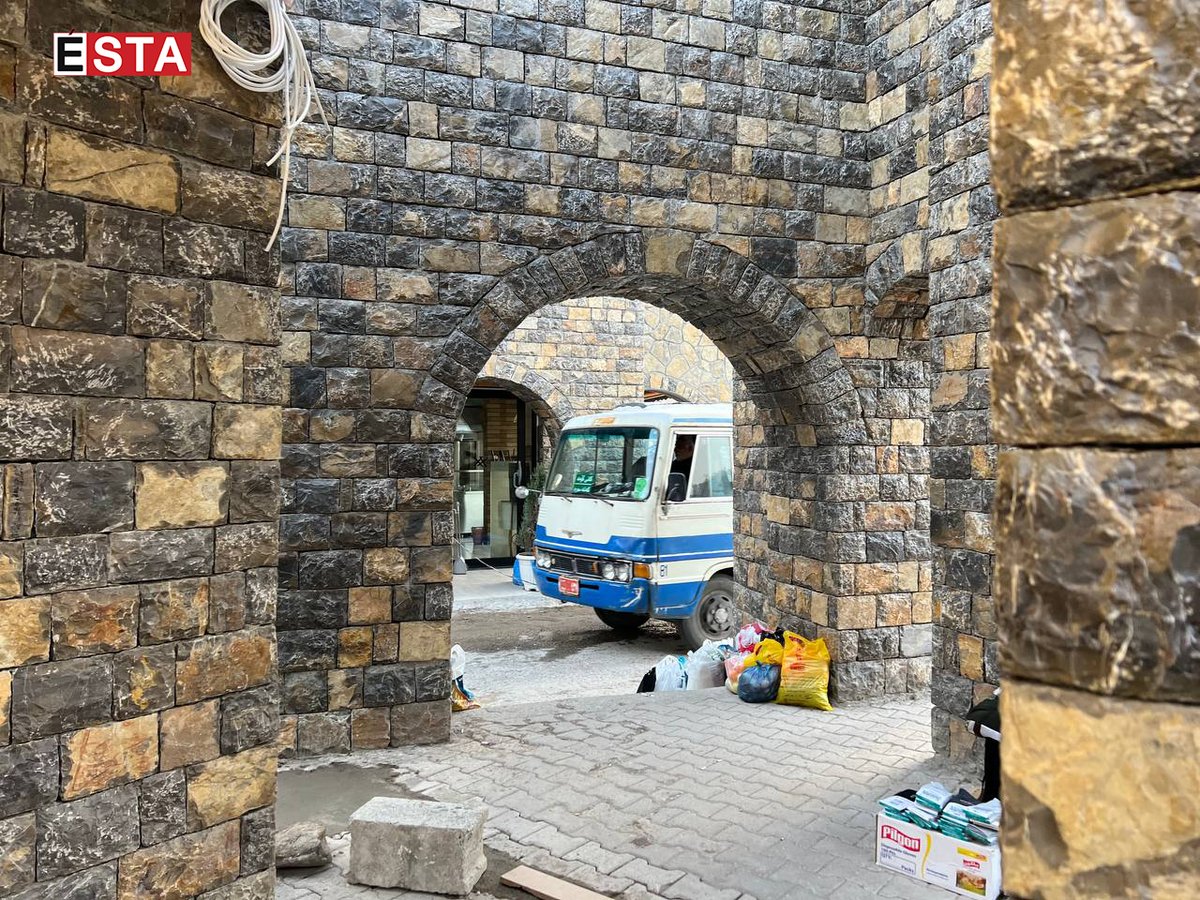 Pictures are seen at the entrance gate of populous Mawlawi street in Sulaimani town center which has been renovated, using stones from the Kurdish town of #Hawraman in redesigning the gate -📸: Abdullah Hussein   
#Esta #TwitterKurds #Kurdistan #beutifulKurdistan