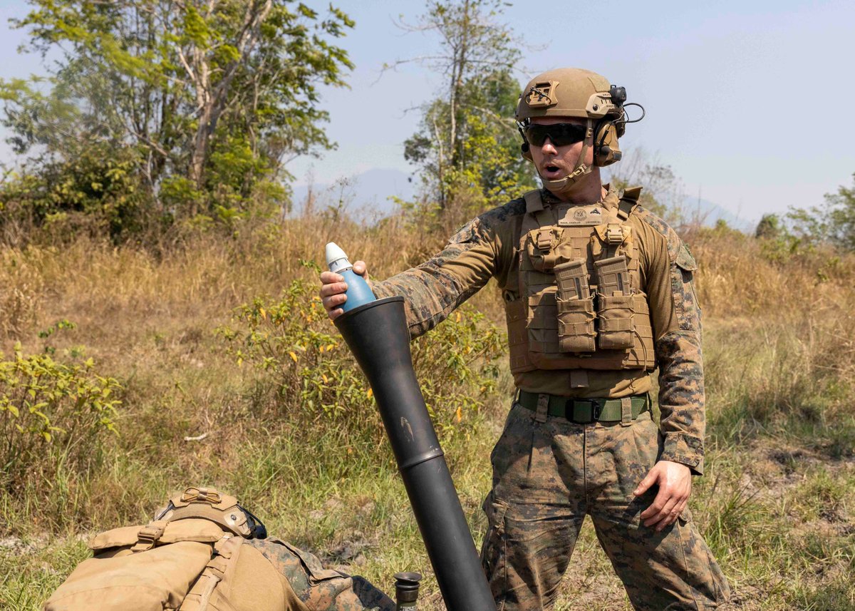 ExerciseCG's tweet photo. U.S. Marines with Battalion Landing Team 2/4, 13th Marine Expeditionary Unit, fire an M252 81mm mortar during a night range at Exercise Cobra Gold in Chantaburi province, Kingdom of Thailand, Feb. 28, 2023. https://t.co/ZxZnie9f1S