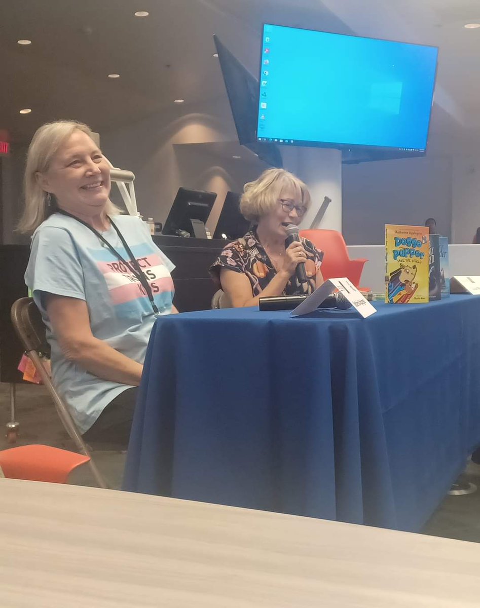 K.A. Applegate wearing a Protect Trans Kids shirt at a panel, Animorphs fans are thriving. 😭😭😭