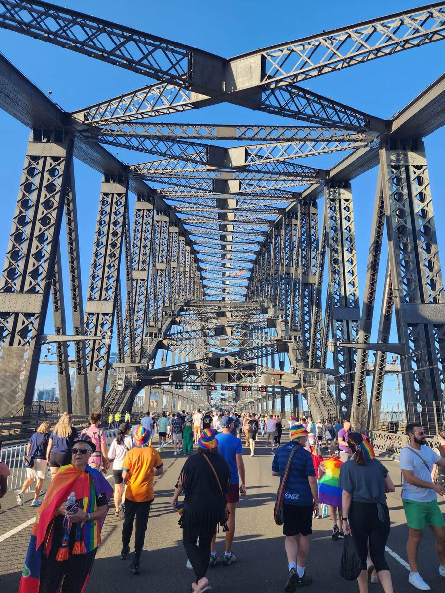 Crowject's tweet photo. we are proud to be sponsors of the amazing team at @crows_rainbow who had the privilege of walking across the Sydney Harbour Bridge as a part of @SydWorldPride this weekend! #sydworldpride #weflyasone #rainbowcrows https://t.co/E6XF1894W4