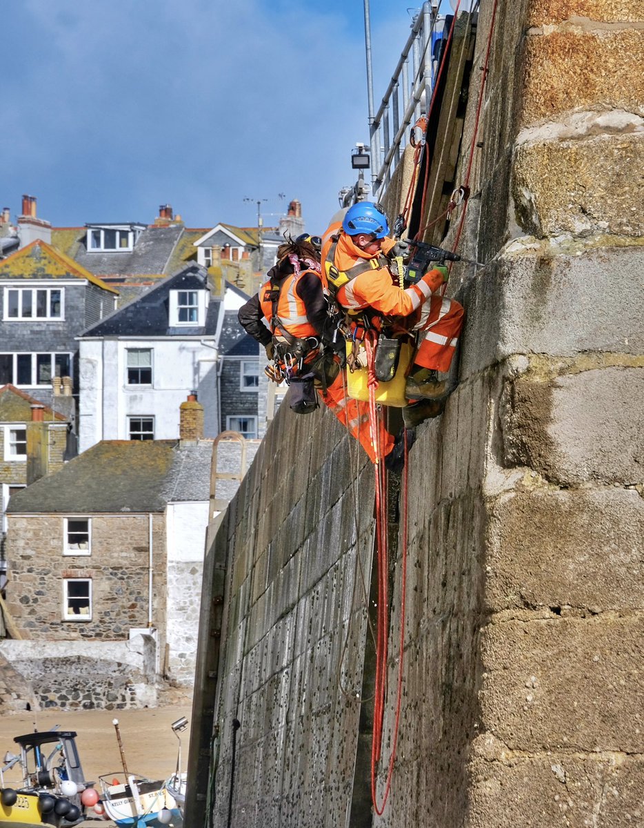 How to fix a pier! #cornwall #kernow #lovecornwall #uk #explorecornwall #cornishcoast #sea #ocean #visitcornwall #stives #stivescornwall #sky #marine #cloud #lighthouse #pier #winter #harbour #abseiling #repairs #marineengineering #workmen #smeatonspier @beauty_cornwall