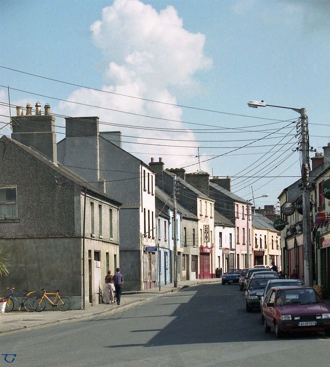 AnTaisce's tweet photo. Irish town streetscapes are like a work of art (Connaught St, Athlone). Many towns have suffered issues of decline &amp; neglect. In this short animated video, architect Orla Murphy summarises the problems &amp; looks at how towns might be repaired &amp; regenerated - https://t.co/6UNbjx4m78 https://t.co/7OblOGZnJb