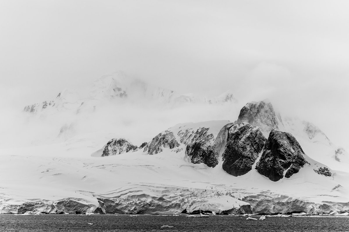 POLAR OPPOSITES

Two images at opposite ends of the earth.
Two scenes quite similar.

Mountains and rock, clouds and mist. Is it all the same?

Image 1: Arctic
Image 2: Antarctic

#PolarOpposites #SeeWithLauri #withmycanon #mycanonstory #blackrapid  #endsoftheearth