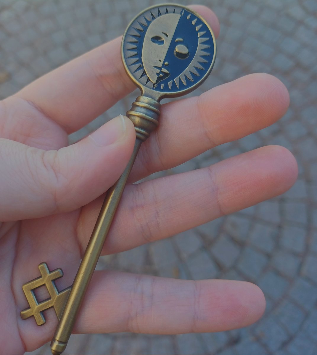 I was walking through town when this kid with a striped shirt came up to me and said "Time delivers us all to the same end. You'll be needing this for what lies ahead." and just walked away.

Anyone know what this key is for? What am I supposed to do with this?