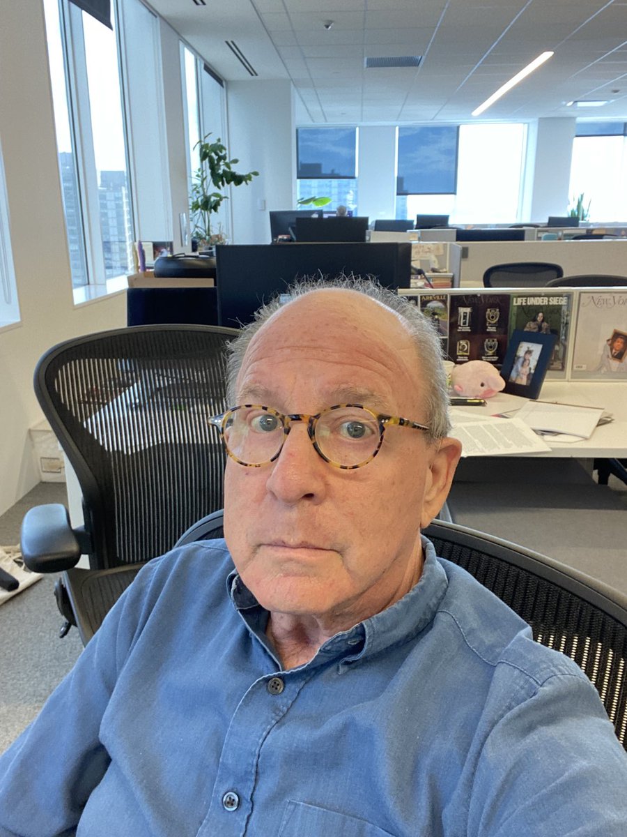 An art critic in the office on a Sunday morning.