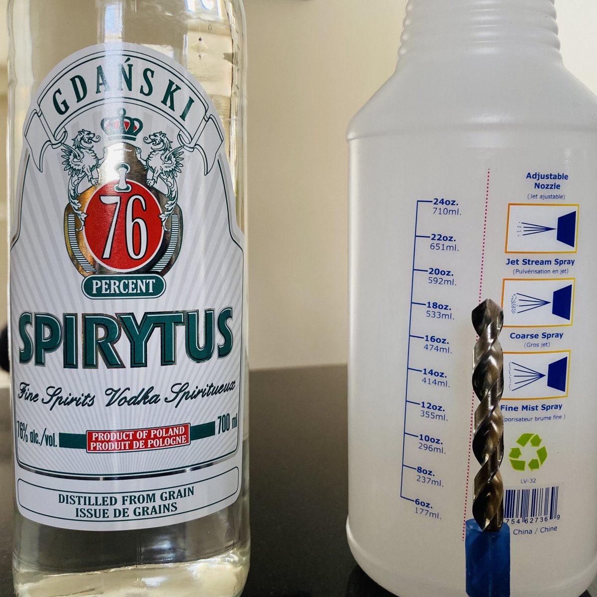 JFClaudeMSM's tweet photo. When tapping, it’s important to sterilize your drill bit in between holes to avoid transferring fungi / bacteria from one tree to another. Didn’t have commercial alcohol on hand, but I figured this would do the trick… 
#Vodka #76percent #151proof
#MapleSyrup #SappyHobbyist https://t.co/wOmWBGt7Vh